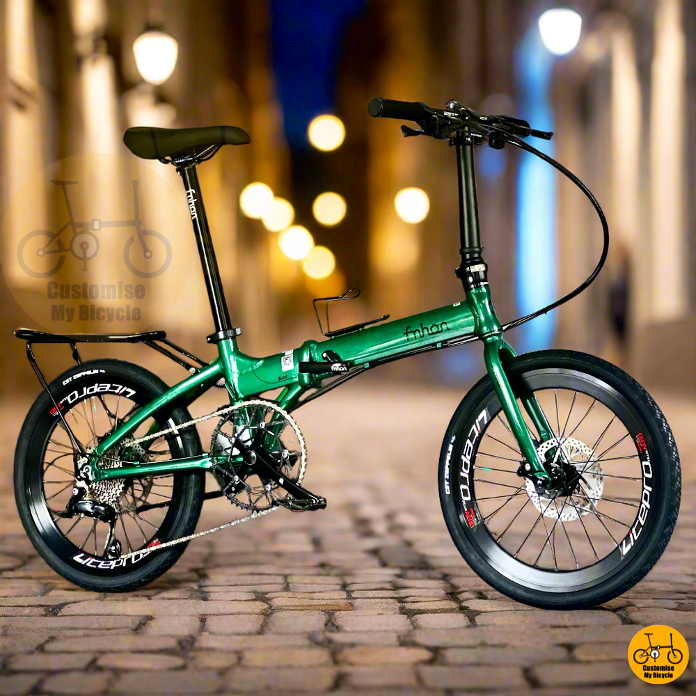 Fnhon Blast 22-inch folding bike in Emerald Green with Shimano 9-speed groupset, rear rack, and CST Zeppelin tyres