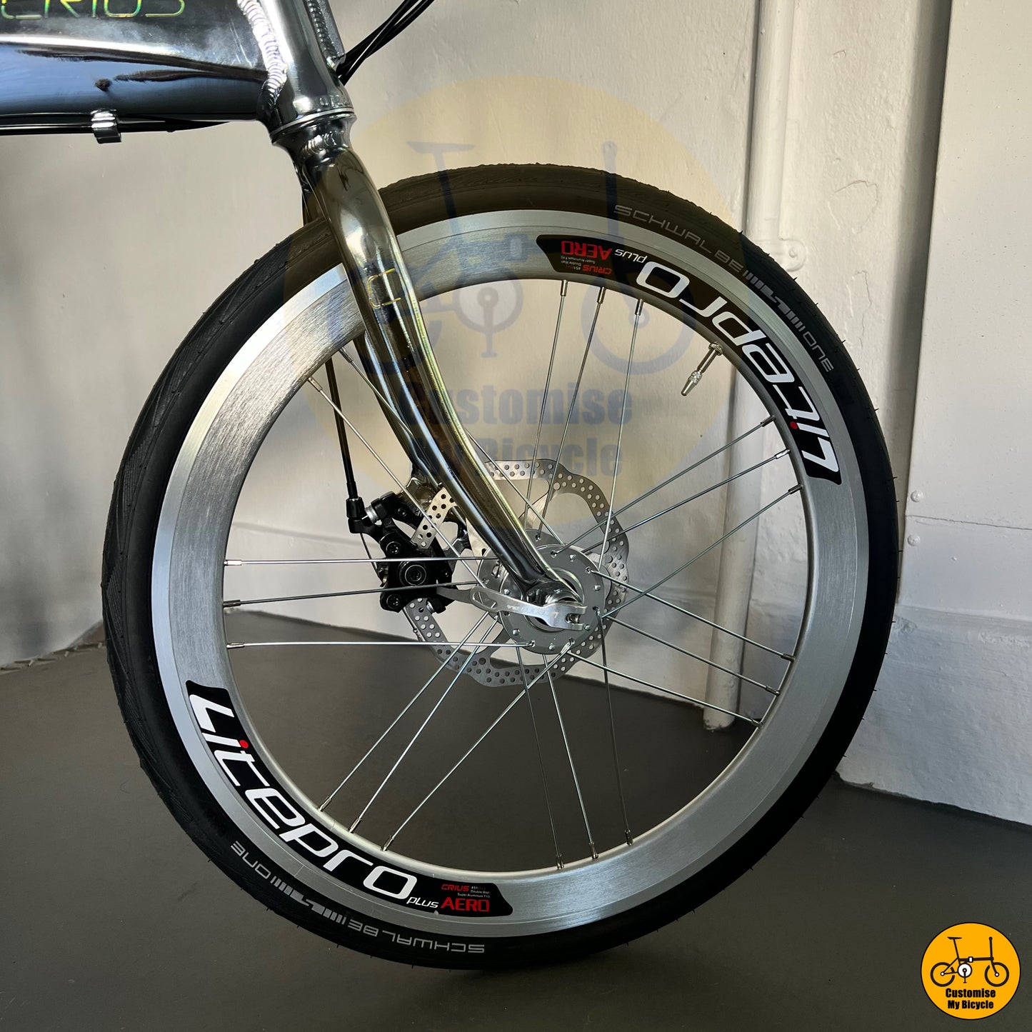Close-up of the Schwalbe One tyres on the Crius Velocity foldie for high-speed performance