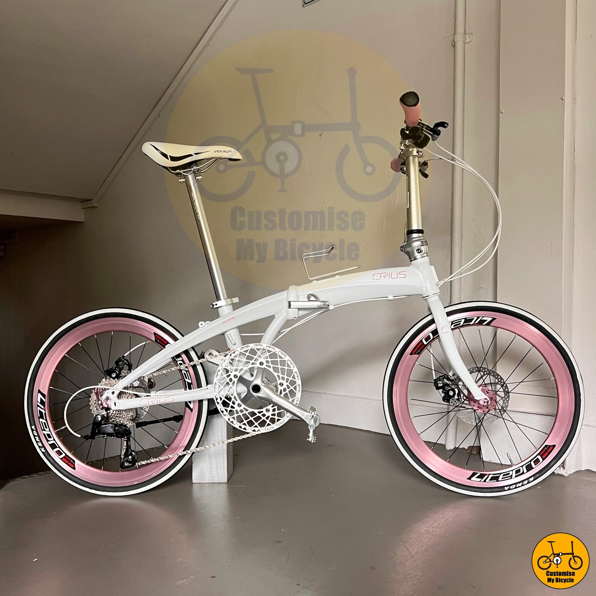 Crius Velocity 22-inch Folding Bike β Snow White Frame with Baby Pink Wheels