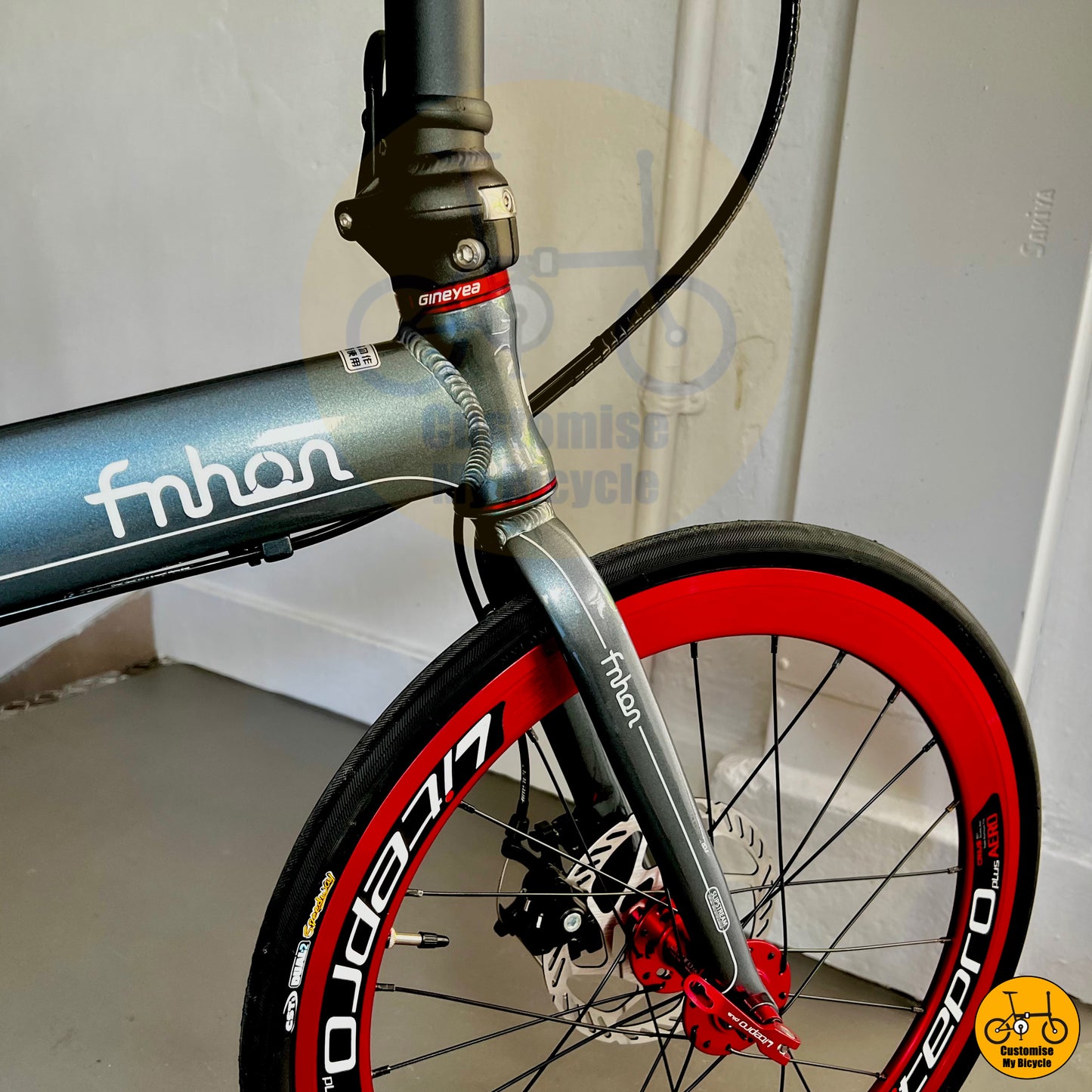 Dolphin Grey & Red Fnhon Blast 22-Inch Foldable Bicycle β A Stylish & Agile Foldie