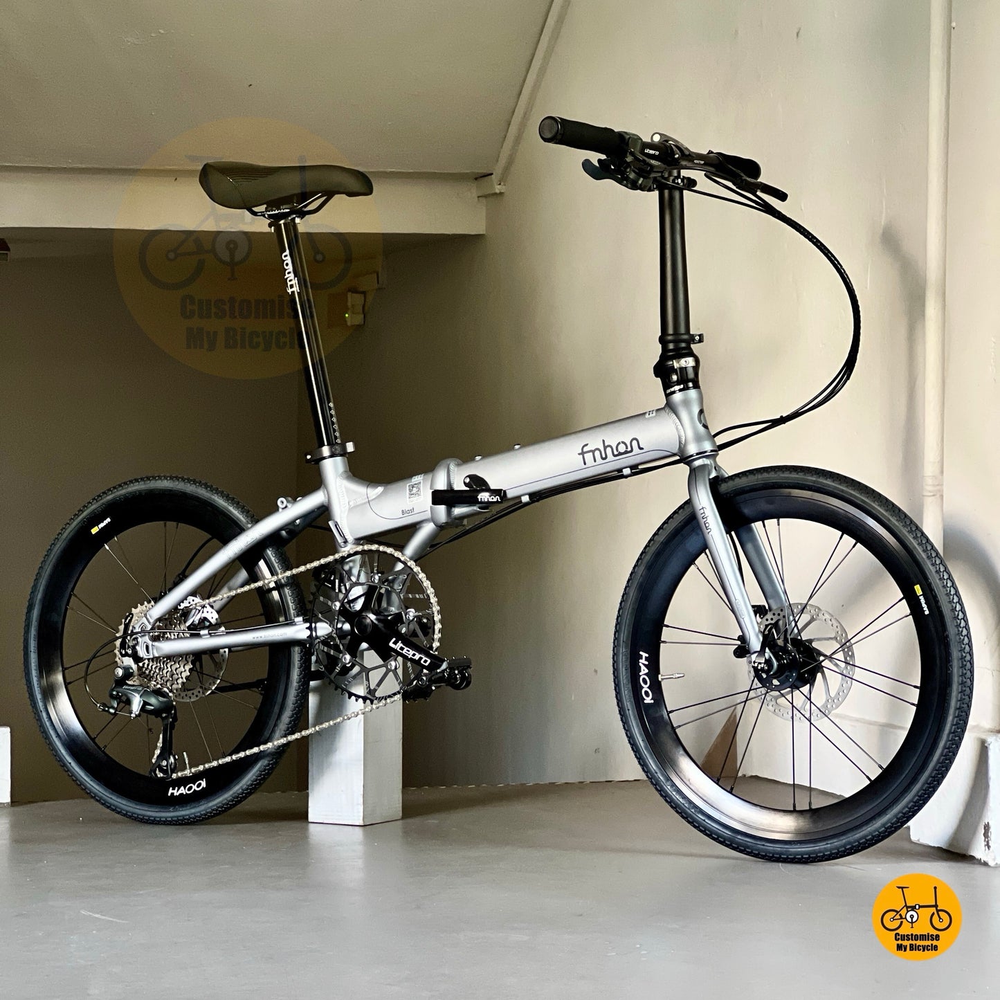 Lightweight Fnhon folding bicycle Battleship Grey with high profile rims and PROMEND pedals