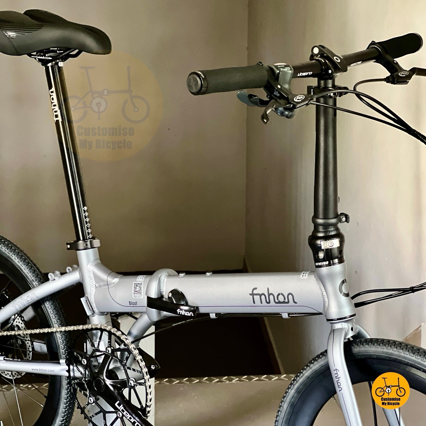 Foldable bicycle close-up of handlepost and frame