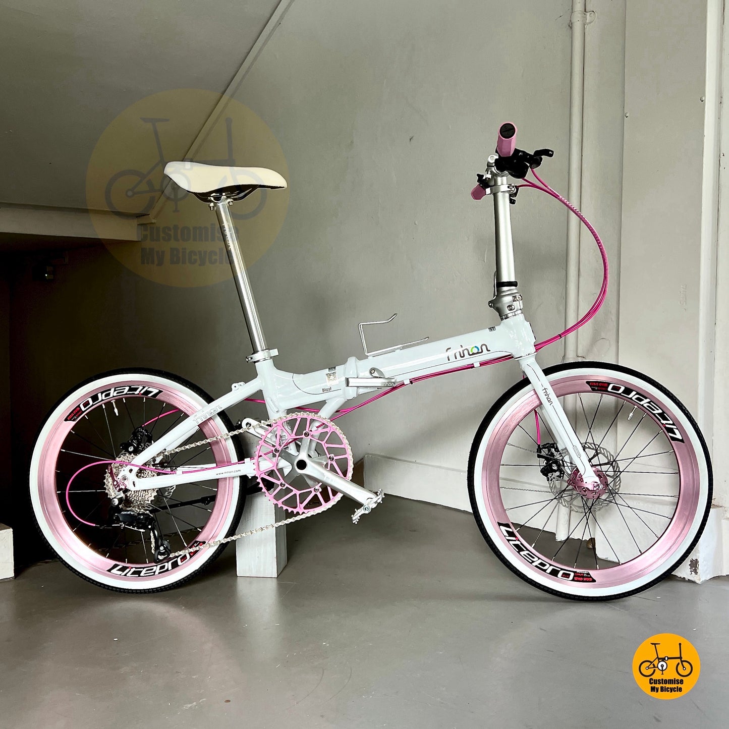 Lightweight Fnhon Blast 22 inch Snow White Pink foldie with Shimano 9s drivetrain