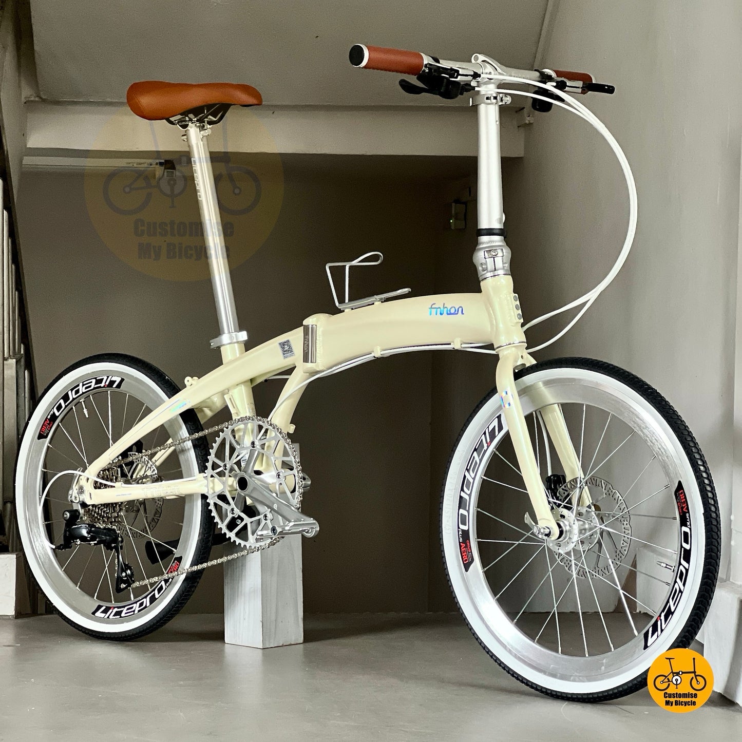 Fnhon Tornado 22 inch folding bike in beige with silver accents