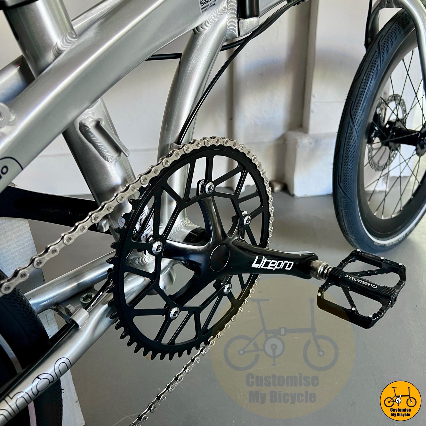 Litepro crankset and hollow 54t chainring detail and Promend quick release pedals R67Q