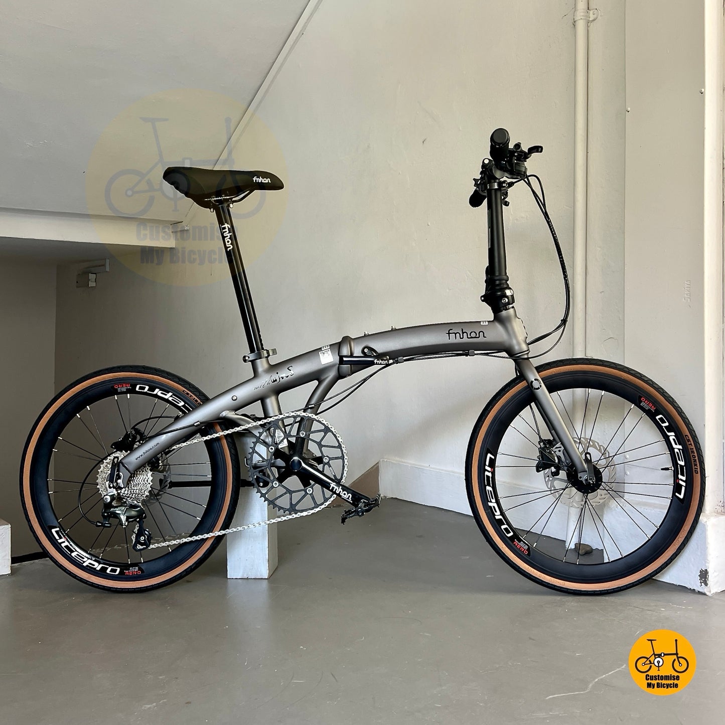 Side view of Fnhon Wind 22 inch Carbon Grey folding bike with Shimano 10 Speed Tiagra gears