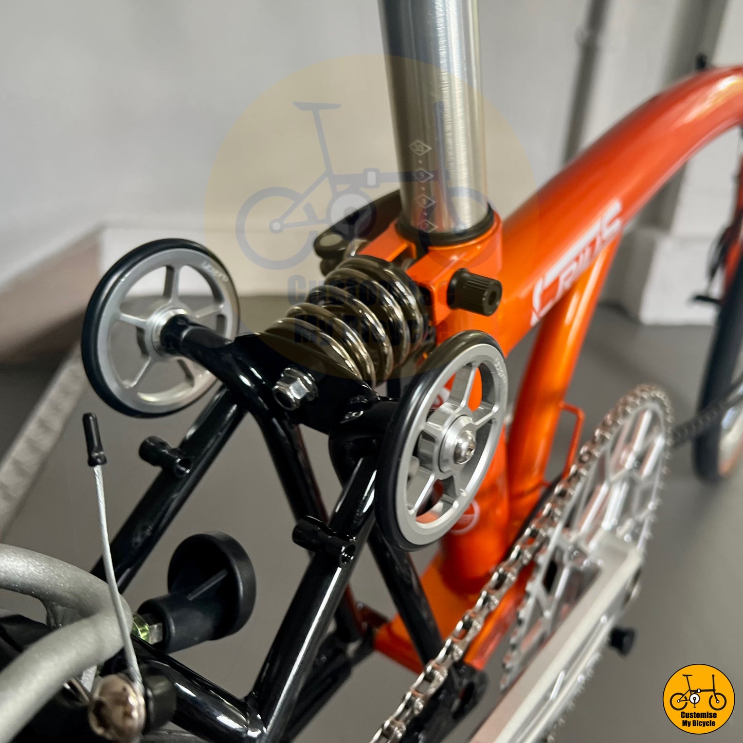 Easy-carry folding bicycle with an elegant orange finish
