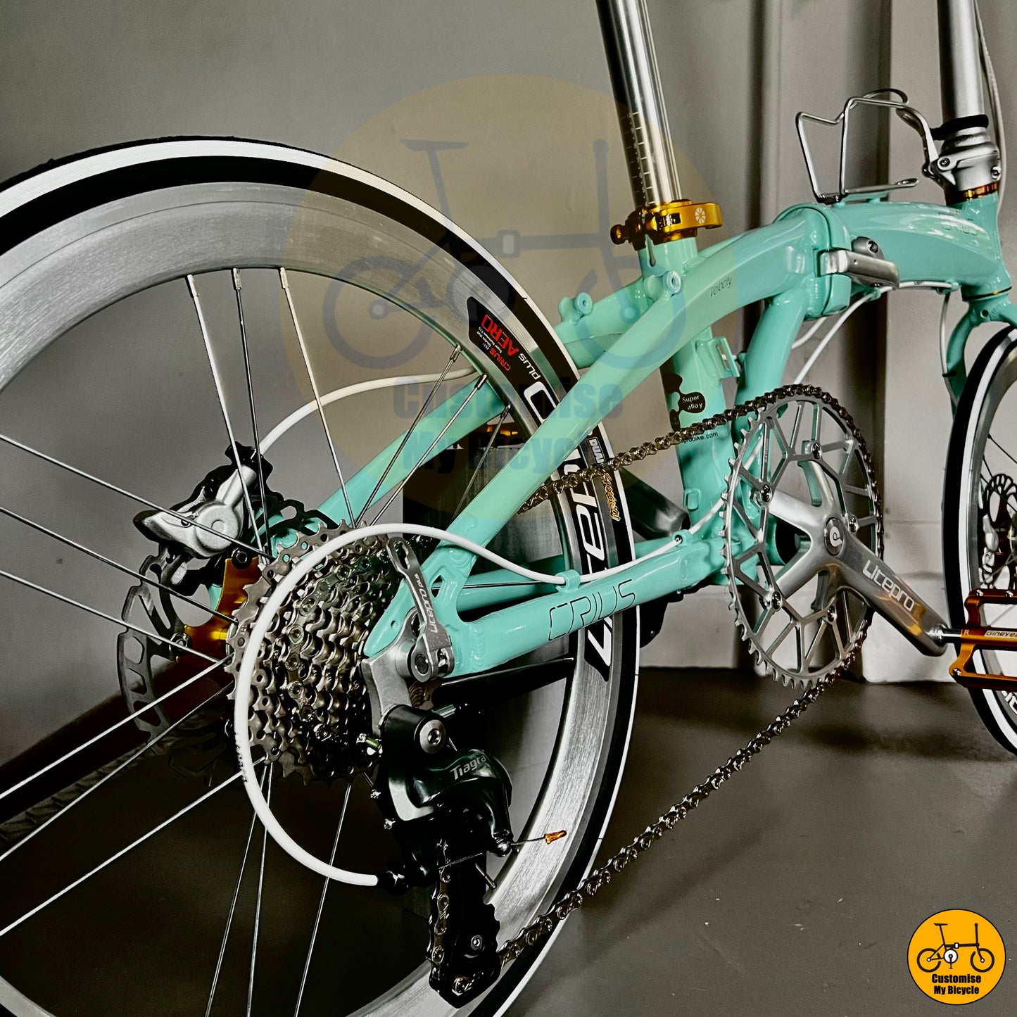 Side profile of the Crius Velocity 22-inch folding bike with white wheels
