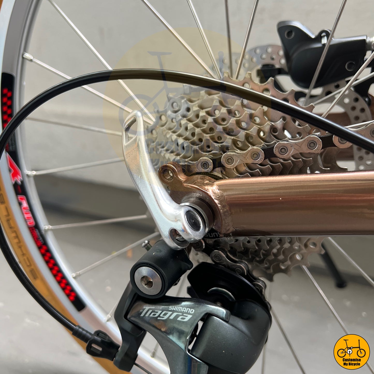 Shimano Tiagra rear derailleur on elegant and practical folding bike with a perfect balance of form and function
