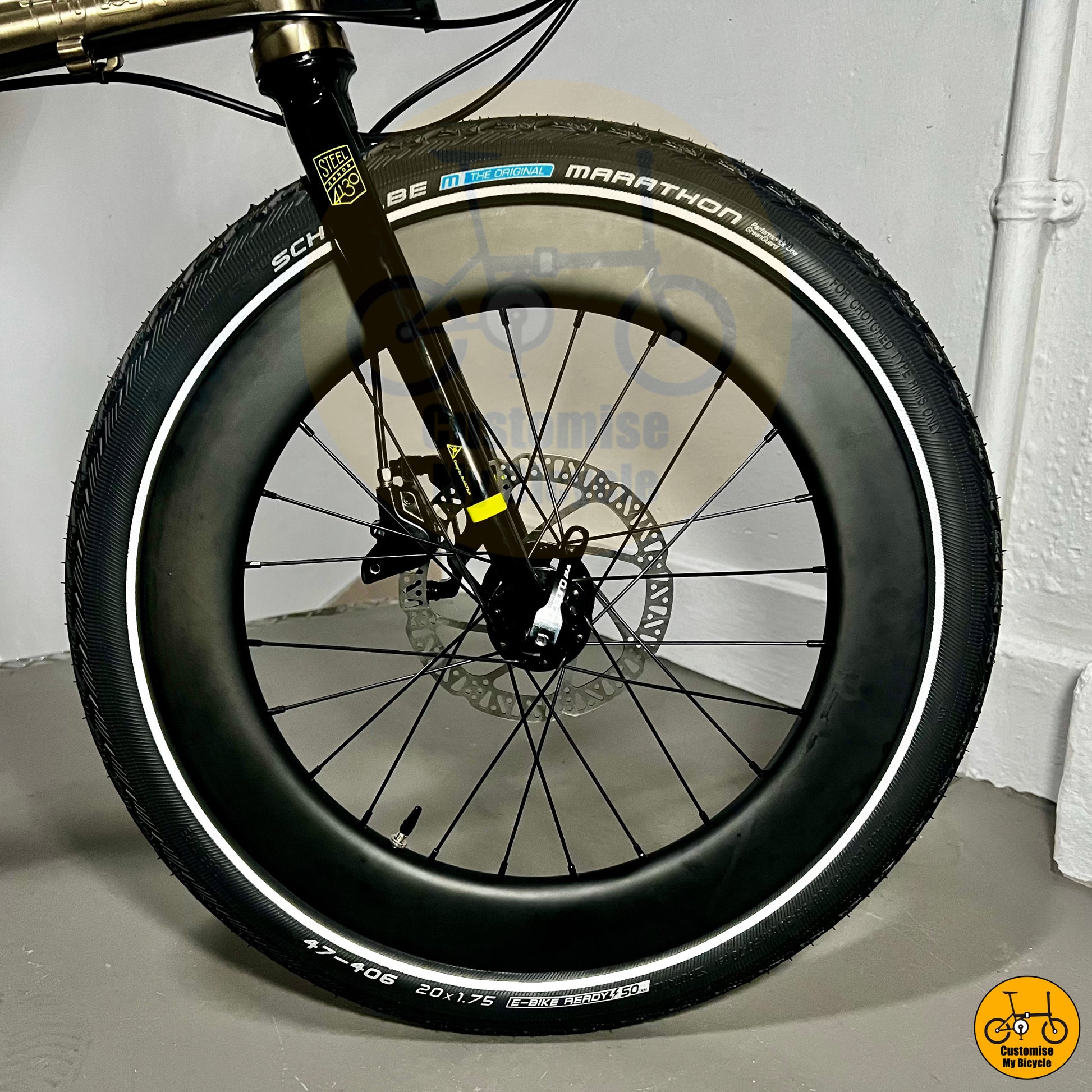 Titanium gold Fnhon Gust 20-inch folding bike with premium touring setup
