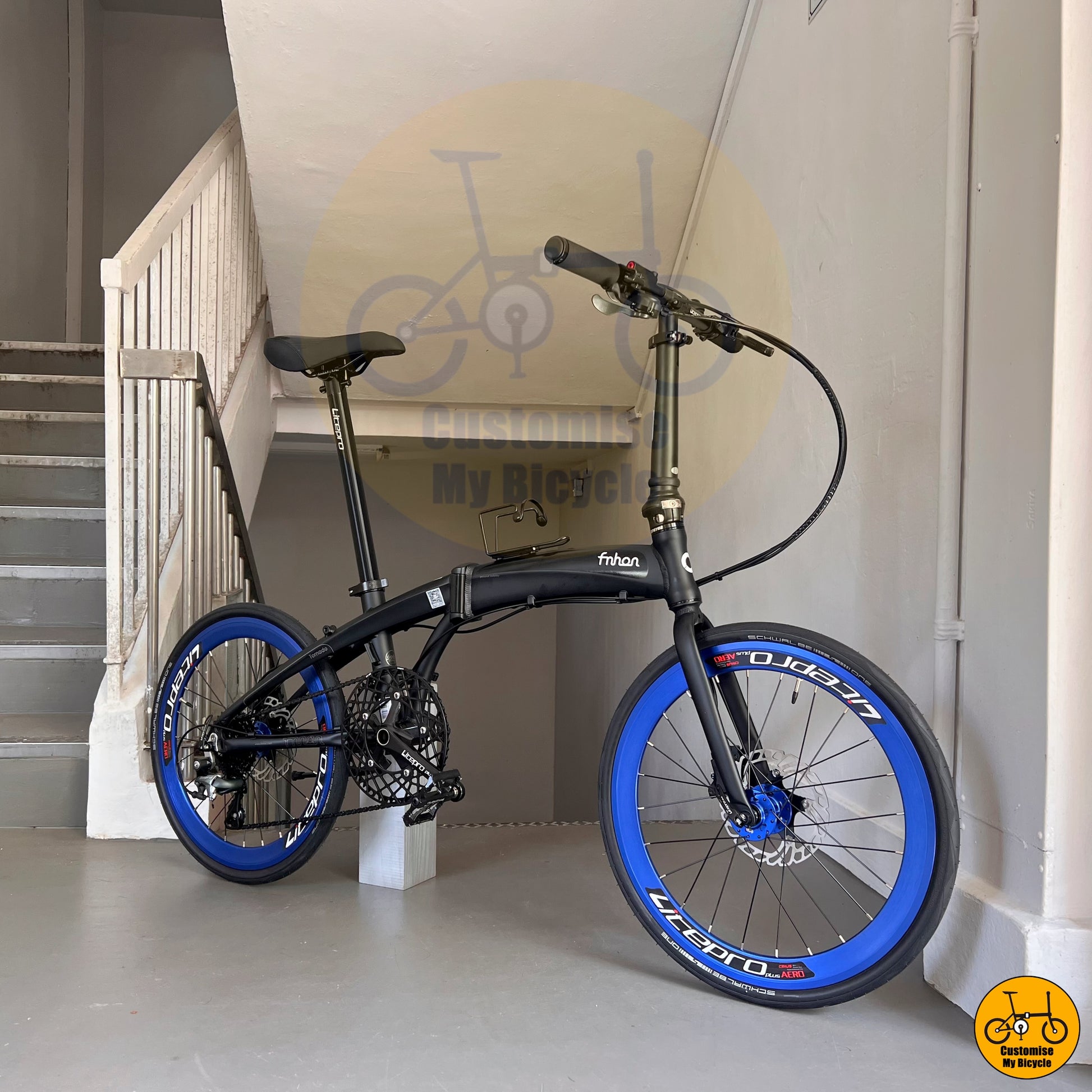 High-Performance Foldie – Sleek Matte Black Frame & Aero Blue Rims
